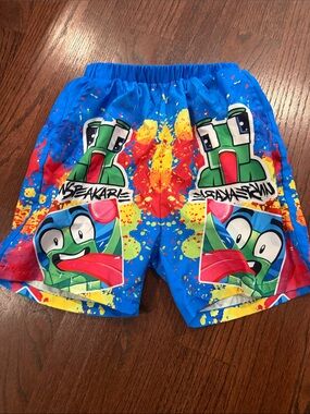 Unspeakable Bright Blue Kids Swim Trunks with Colorful Character Print